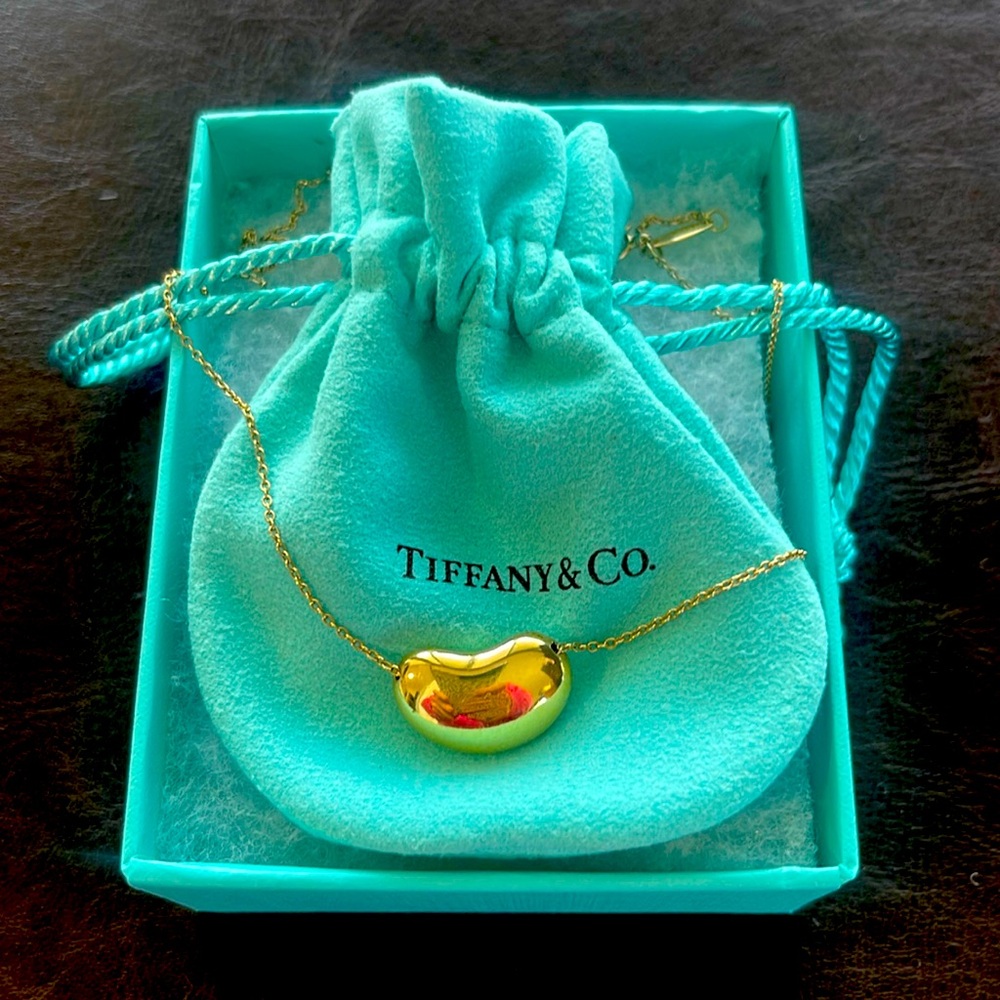 Tiffany 18K Yellow Gold Bean necklace - 18 mm pendant; 18” chain.